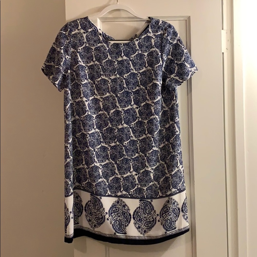 Short, loose fitting, short sleeve dress.